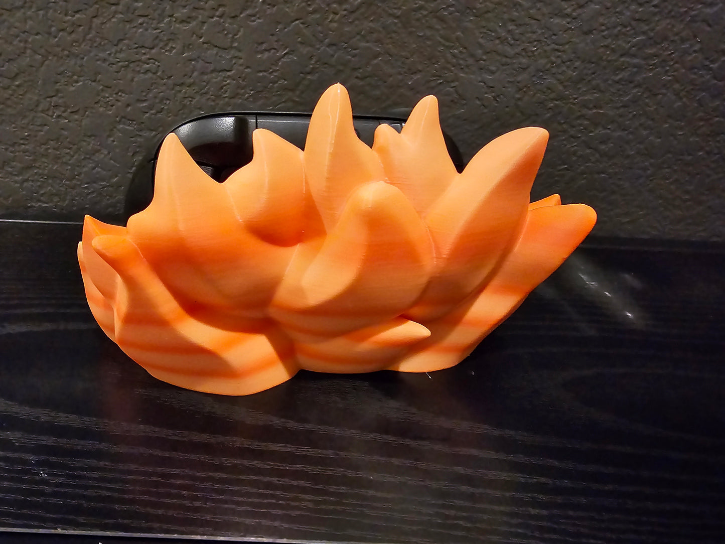 Flame controller holder